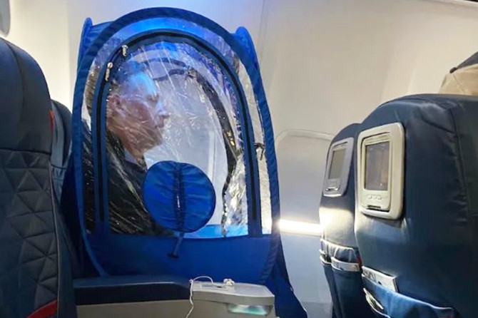 神操作!為防冠狀病毒 男子帶便攜帳篷坐飛機(jī)521557_ 神操作!為防冠狀病毒 男子帶便攜帳篷坐飛機(jī)